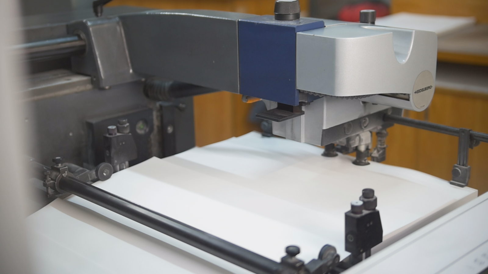 Die cutting press in operation